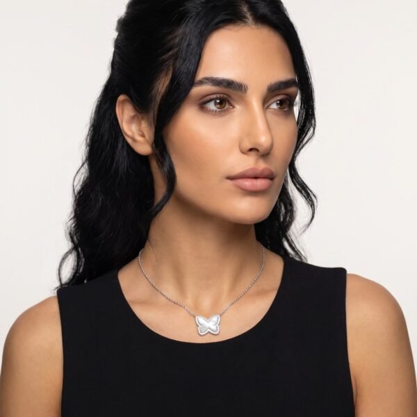 Model wearing Crystal Butterfly Necklace in silver