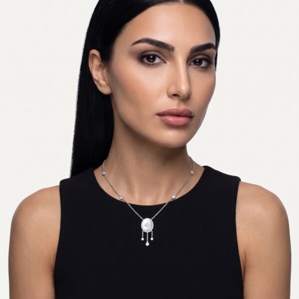 Model wearing Dreamcatcher Necklace in silver