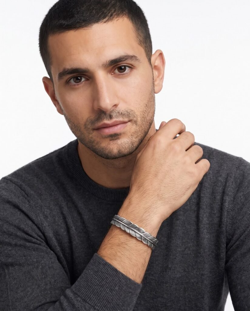Model wearing Feather Cuff Bracelet in silver