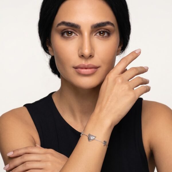 Model wearing Leopard Charm Bracelet in silver