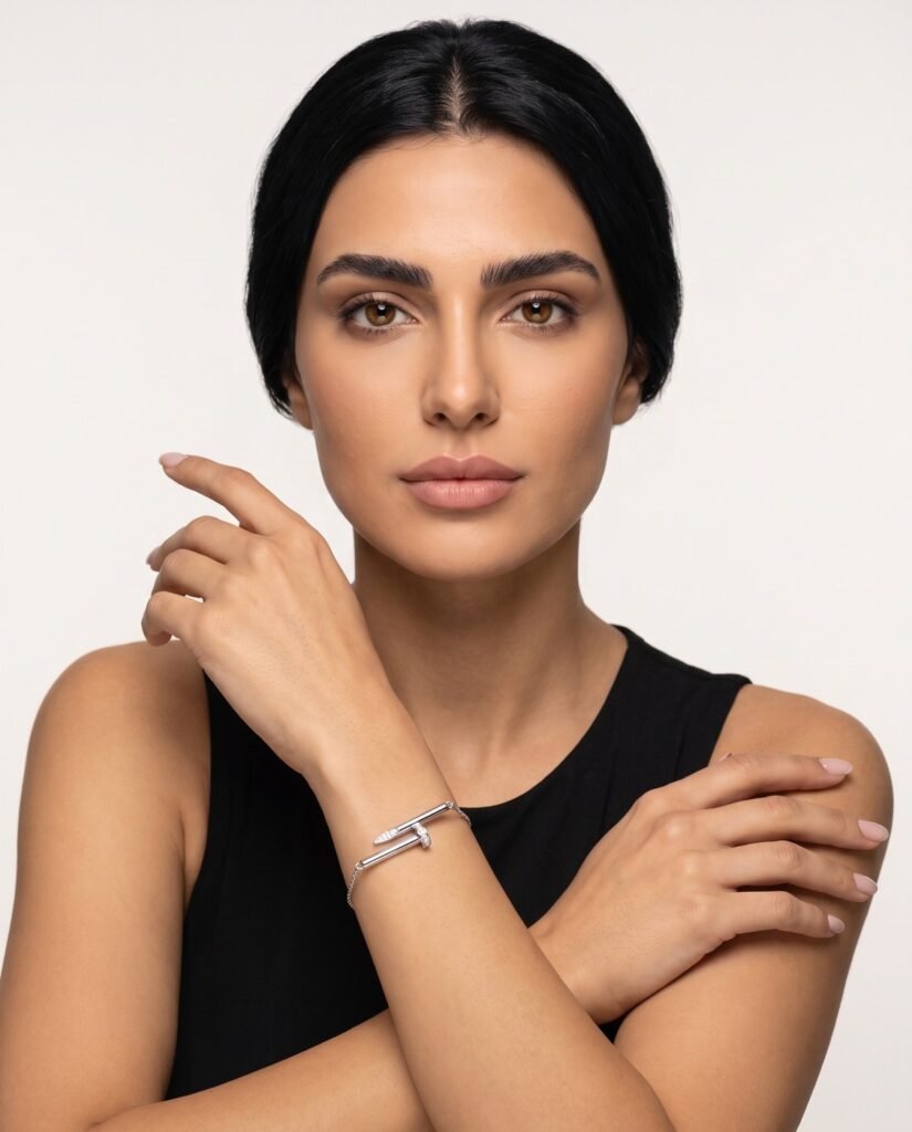 Model wearing Minimalist Nail Bracelet in silver