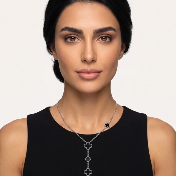 Model wearing Onyx Clover Drop Necklace in silver