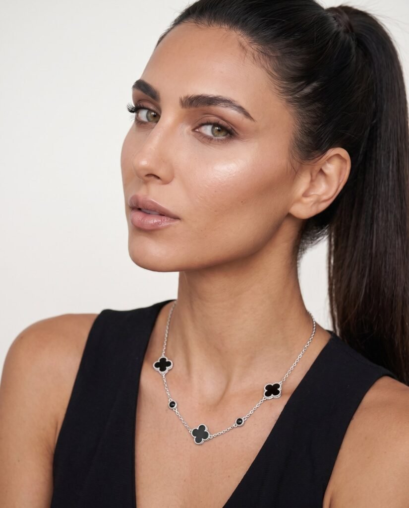 Model wearing Onyx Clover Necklace in silver