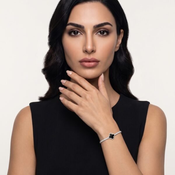 Model wearing Onyx Clover Tennis Bracelet in silver