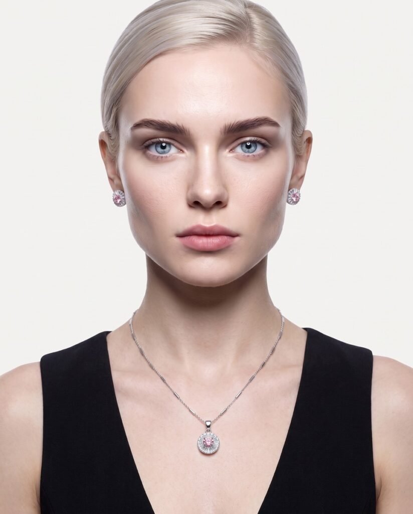 Model wearing Pink Halo Necklace Set in silver