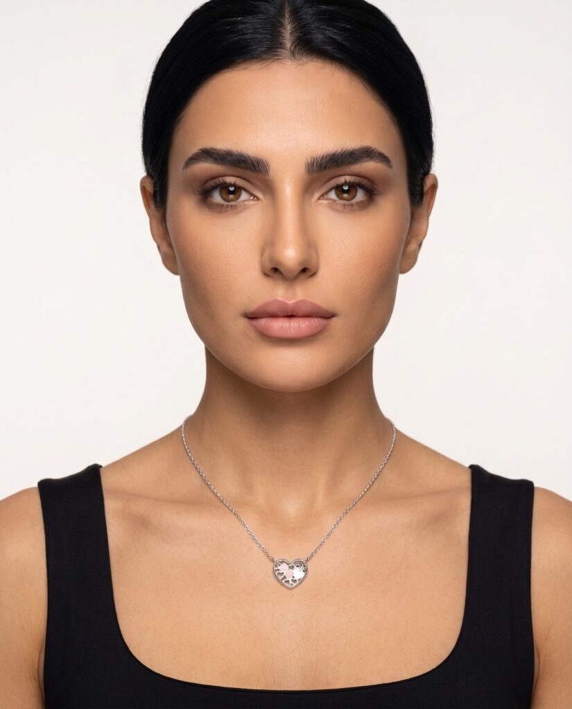 Model wearing Pink Heart Necklace in silver