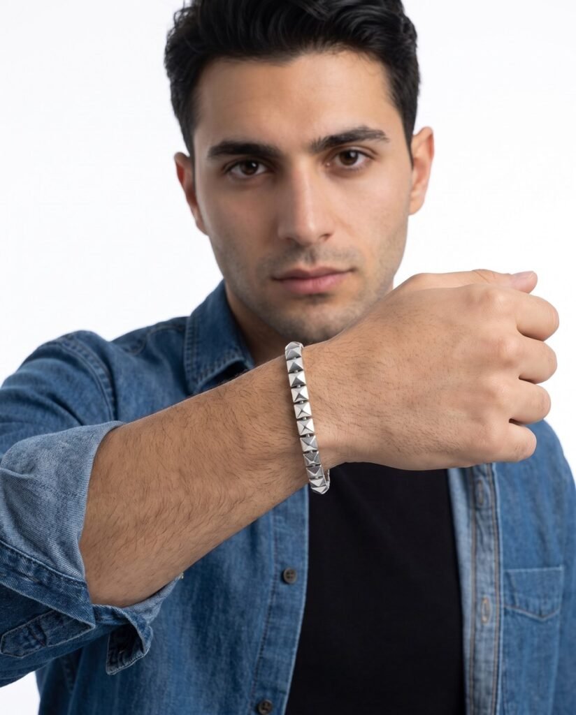 Model wearing Pyramid Stud Bracelet in silver