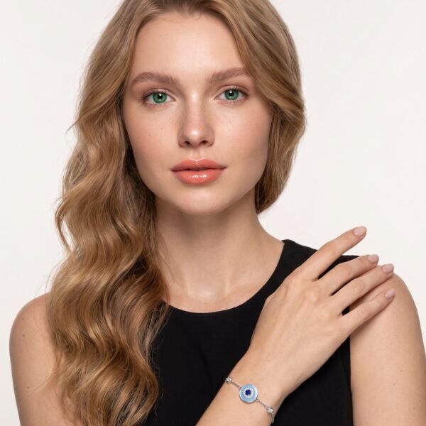 Model wearing Blue Bead Evil Eye Bracelet in silver